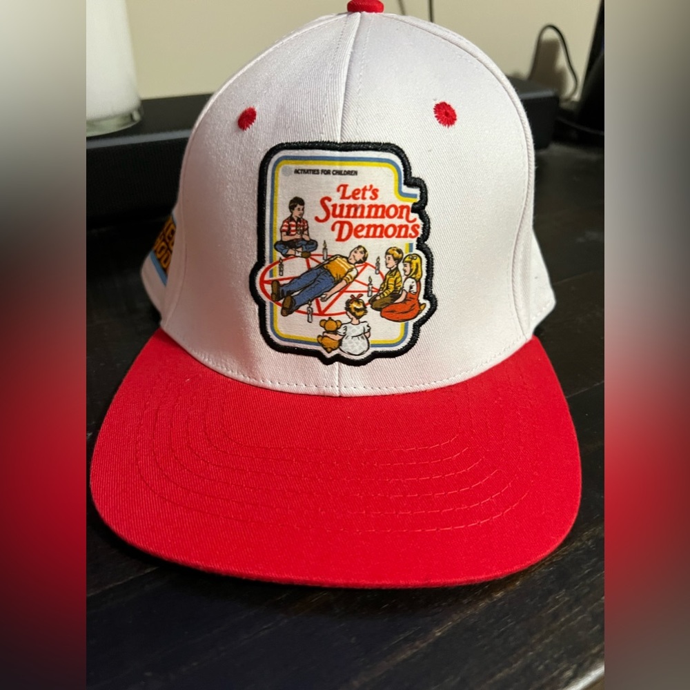 Spencer’s Steven Rhodes white red hat 70’s vintage Style let’s summon demons